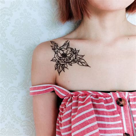 Symmetrical Flower tattoos Ling Flower tattoos Minimal Flower | Etsy | Floral tattoo shoulder ...