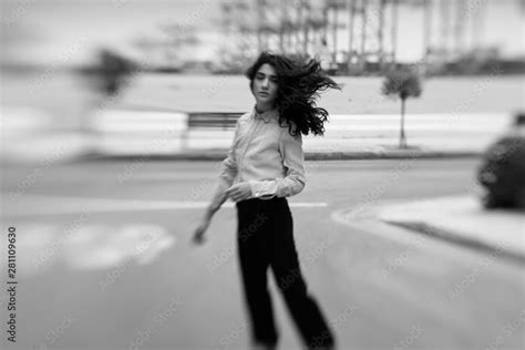 Wind in her hair Stock Photo | Adobe Stock