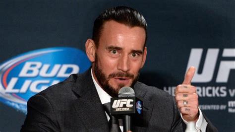 CM Punk joins UFC, will fight in 2015