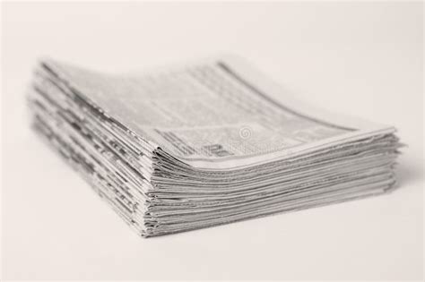 Stack of old newspapers stock image. Image of background - 269521237