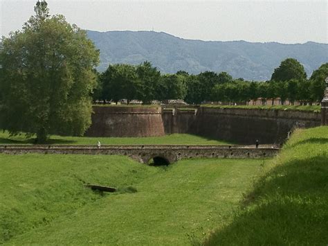 The succession of #Lucca walls built were never in use as a defense but ...