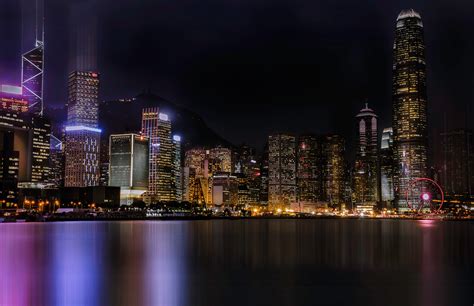 Cityscape by water during nighttime HD wallpaper | Wallpaper Flare