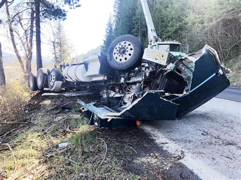 The driver of a truck hauling lumber was not injured in an accident on State 5 at the 8.5 mile ...