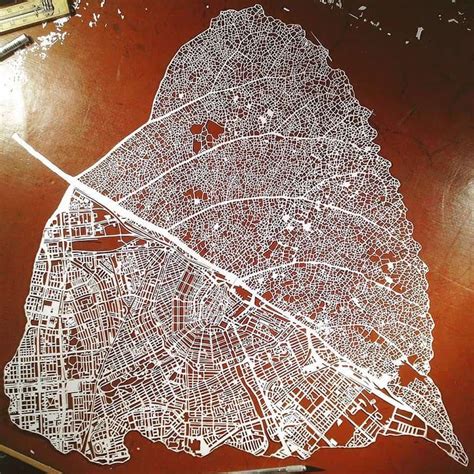 Hand Cut Paper Map of Amsterdam in the Shape of a Leaf - Geography Realm