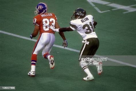 Aaron Glenn the New York Jets guards Anthony Miller of the Denver... News Photo - Getty Images