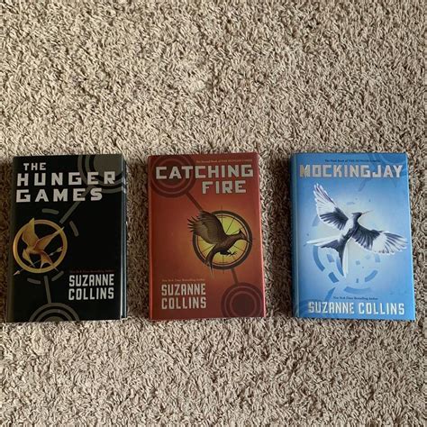 📚 The Hunger Games Trilogy by Suzanne Collins ... - Depop