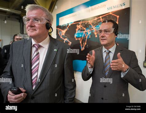 Premier of Bavaria Horst Seehofer (L) visits the Siemens' Factory with President of Siemens Ltda ...