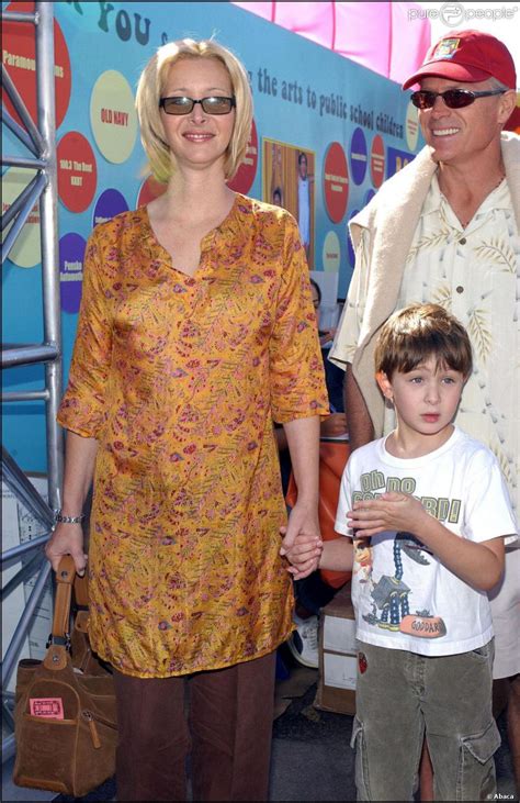 Lisa Kudrow, son fils Julian et son époux Michel en 2003. - Purepeople