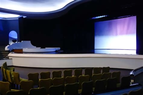 Premium Photo | Old theater interior view with rows of seats and stage