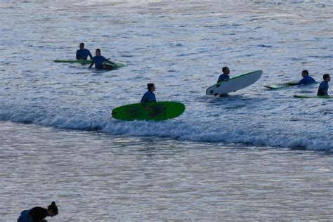 young athletes practising the water sport of surfing 21544301 Stock ...