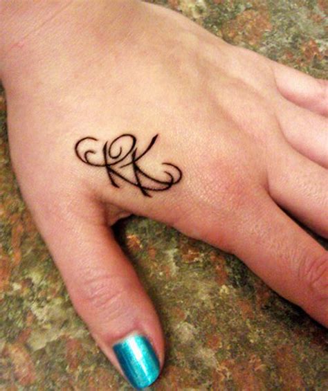 Initials "RK" – Tattoo Picture at CheckoutMyInk.com | Name tattoo on hand, Tattoo lettering ...