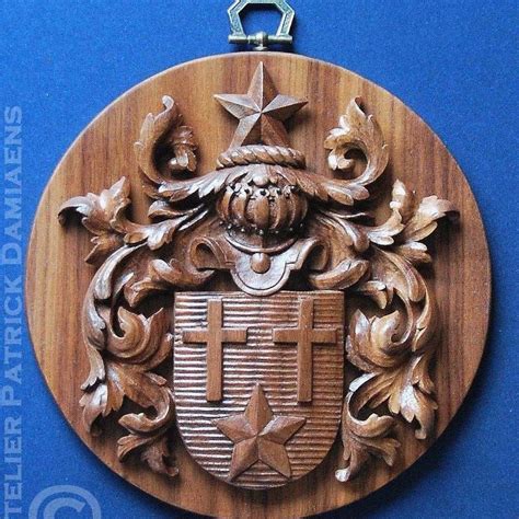 . Creation of a wooden family coat of arms - crest . Heraldic family ...