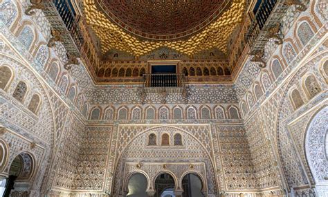 the interior of a building with intricately decorated walls