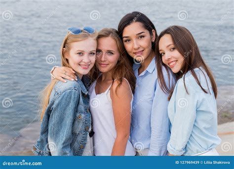 Portrait of Four Femle Friends Looking Friendly at Camera, Smile, Happy. People, Lifestyle ...