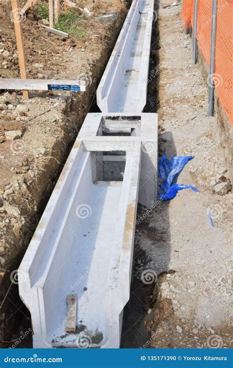 Street gutter construction stock photo. Image of concrete - 135171390