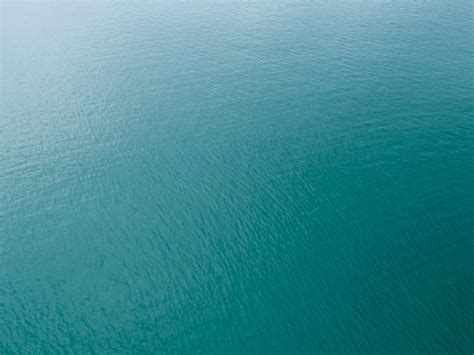 Premium Photo | Sea surface aerial view,Bird eye view photo of small ...