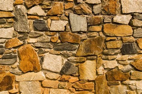 Rust Colored Stone Wall Stock Images - Image: 3258474