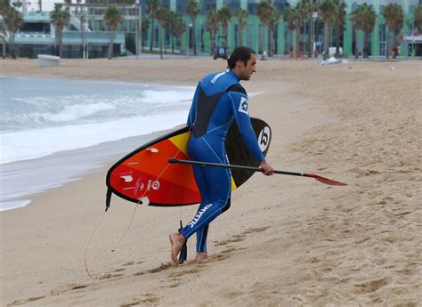 Winter surfing on the beach of San Sebastian (Platja de Sant Sebastià)