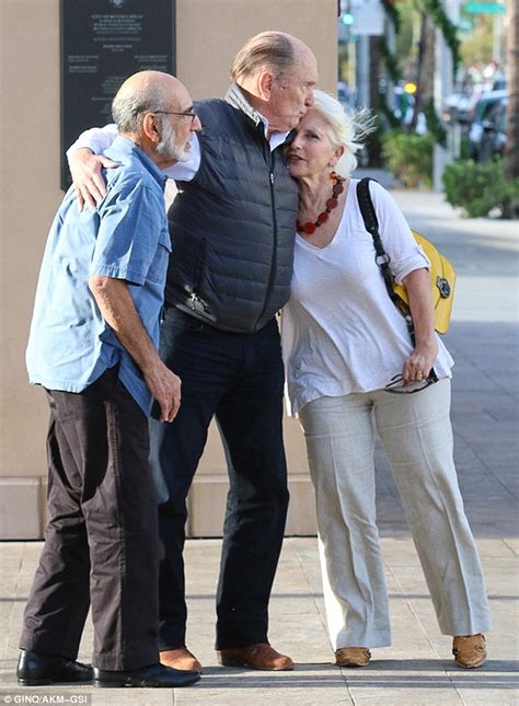 Robert Duvall, 83, cradles baby in his arms at lunch with much younger wife Luciana Pedraza, 42 ...