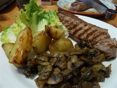 Kitchen Fairies: Steak and roasted new potatoes, with garlic mushrooms.