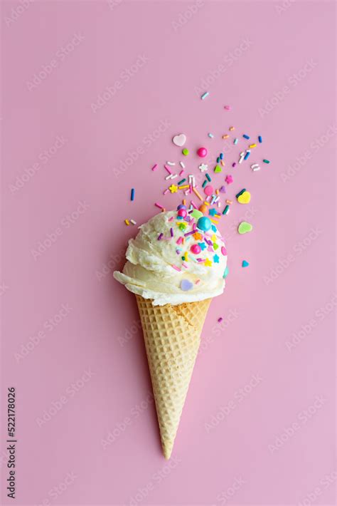 Ice cream with sugar sprinkles in a wafer cone Stock Photo | Adobe Stock