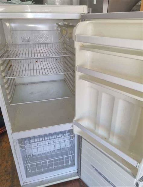 White Defy fridge freezer | Vuyani Furniture Transport & Sales