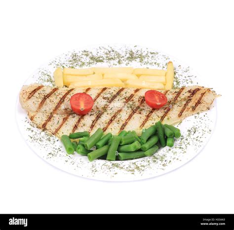 Pangasius fillet grilled with vegetables Stock Photo - Alamy