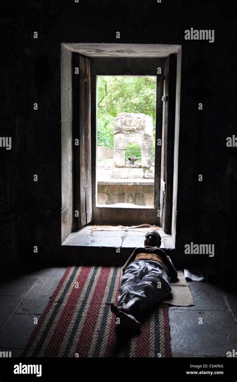 old man sleeping near the open door Stock Photo - Alamy