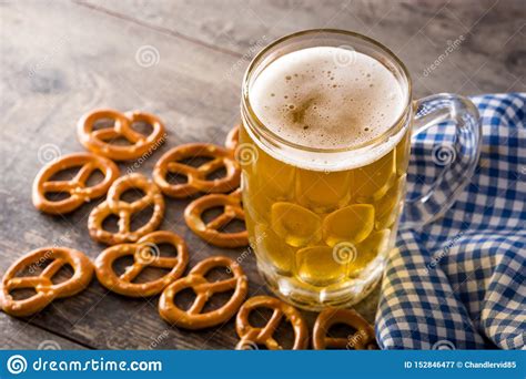 Oktoberfest Beer with Pretzels on Wooden Table. Stock Image - Image of snack, oktoberfest: 152846477