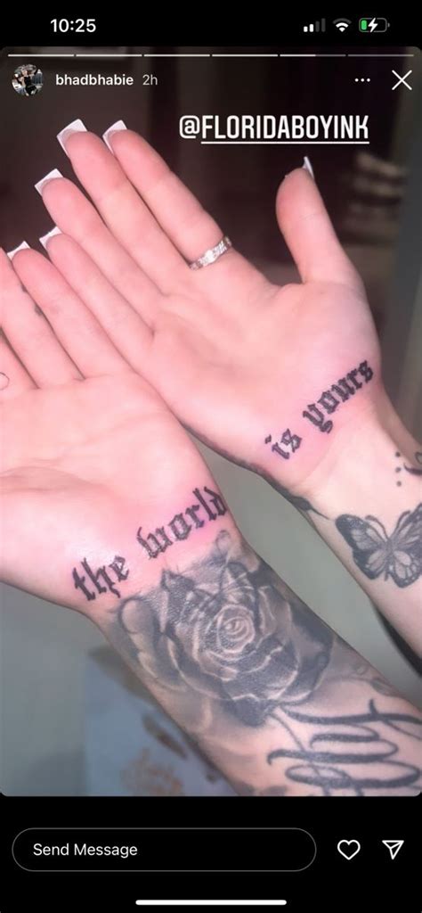 two hands with tattoos on them and one has the words, my love is mine