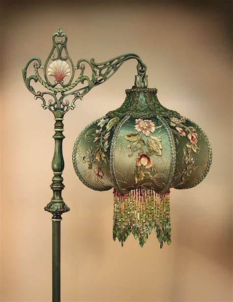 Such a lovely Victorian lamp with beaded fringe lamp shade. Probably doesn't allow much light ...