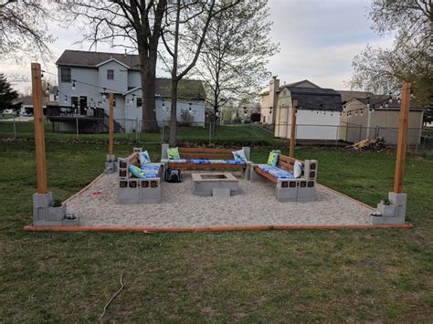 Concrete block and pea gravel fire pit backyard | Fire pit backyard ...