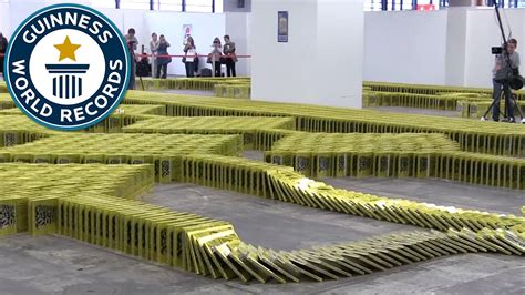 Crazy Book Dominoes! - Guinness World Records - YouTube