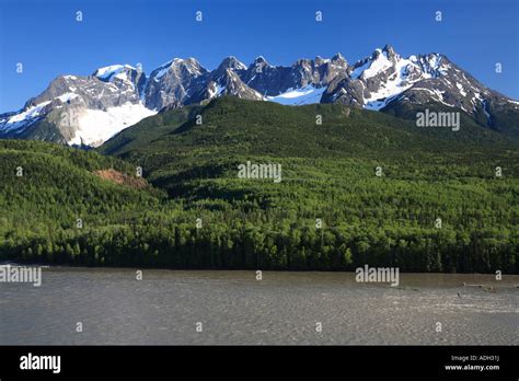 The Seven Sisters Mountain range and the Skeena river near Kitwanga British Columbia Stock Photo ...