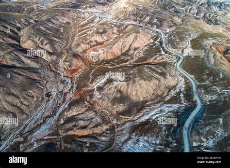 aerial view of the curved Qilian mountain road Stock Photo - Alamy