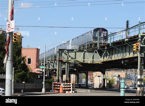 elevated subway train traveling over a street in Brooklyn New York USA Stock Photo - Alamy