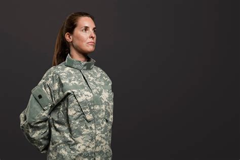 Free Photo | Female soldier standing at ease military posture