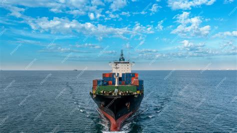 Premium Photo | Aerial side view of cargo ship carrying container and running for export goods ...