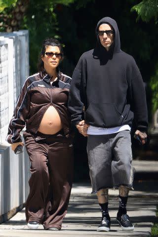 Pregnant Kourtney Kardashian Shows Off Her Bare Bump on Sunny Stroll ...