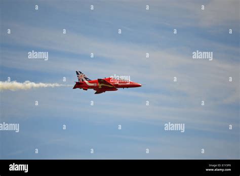 red arrow plane in flight Stock Photo - Alamy