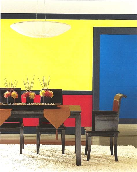 Blocking design using vivid red, yellow, and blue in this dining room is bold and daring ...