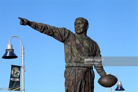 Earl L. Lambeau statue sits in Harlan Plaza at Lambeau Field, home of ...