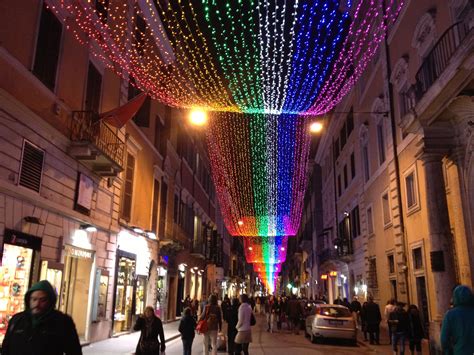 Rainbow Christmas lights in Rome! Loving this festive atmosphere Rainbows Christmas, Holiday ...