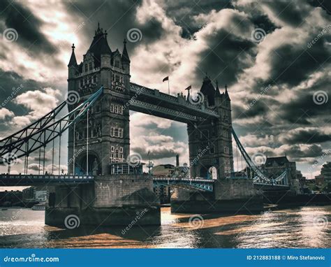 Tower Bridge is a Drawbridge in London Over the River Thames. Next To ...