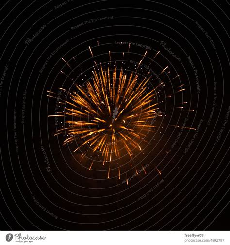 Fireworks exploding against black background - a Royalty Free Stock ...