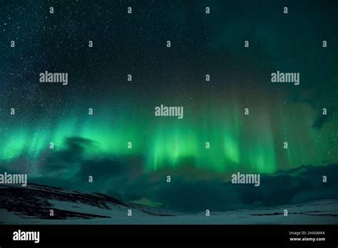 Beautiful Northern Lights green photographed in Iceland in February Stock Photo - Alamy