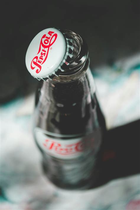Shallow Focus Photography of Pepsi-cola Bottle Cap · Free Stock Photo