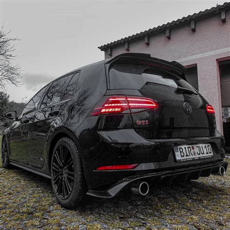 Sleek Black Golf 7.5 GTI - The Epitome of Power and Style