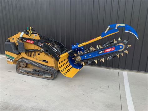 Skid Steer with Chain Trencher – AM Hire