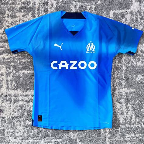 Olympique Marseille Dritte Fußball-Trikots 2022 - 2023. Sponsored by Cazoo